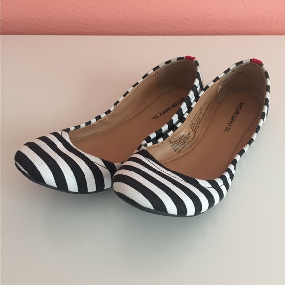 black and white striped ballet flats